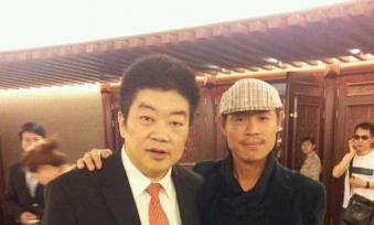 周厚林与中国顶级企业家爱国者集团总裁(冯军)合影